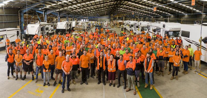 Hundreds of supporters in matching orange fundraiser tees