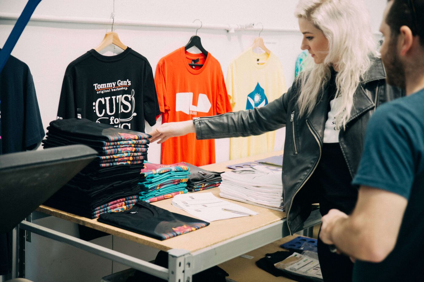 Printed club tees being packed at The Tshirt Mill in Brisbane
